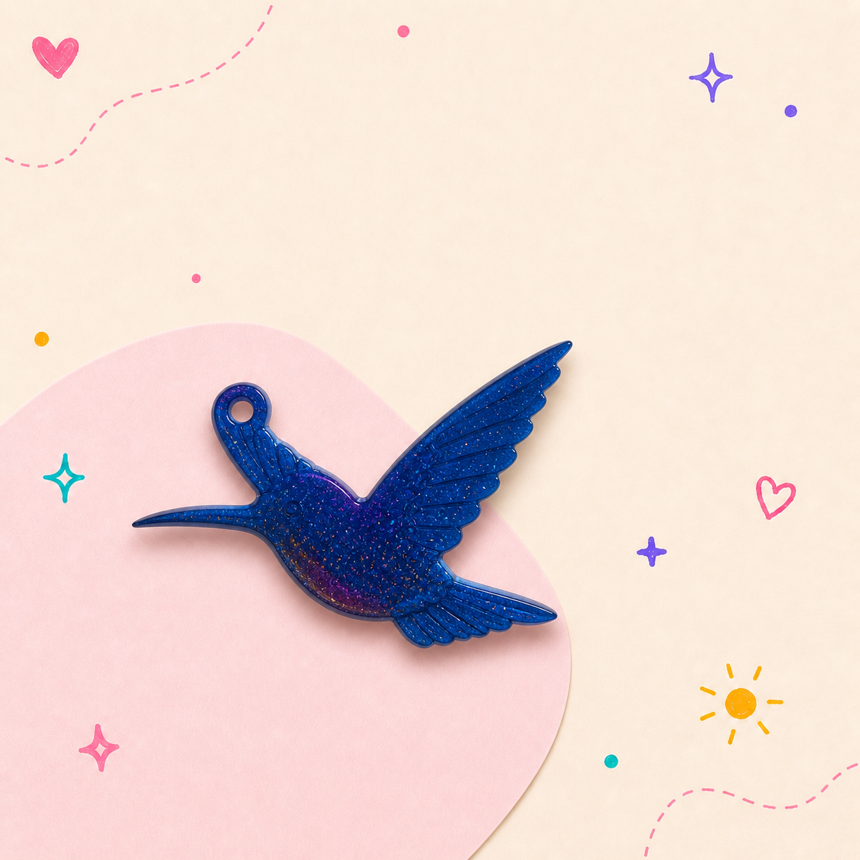 Blue hummingbird resin charm with gold hardware